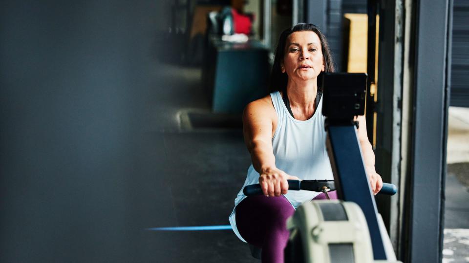 Woman on rowing machine