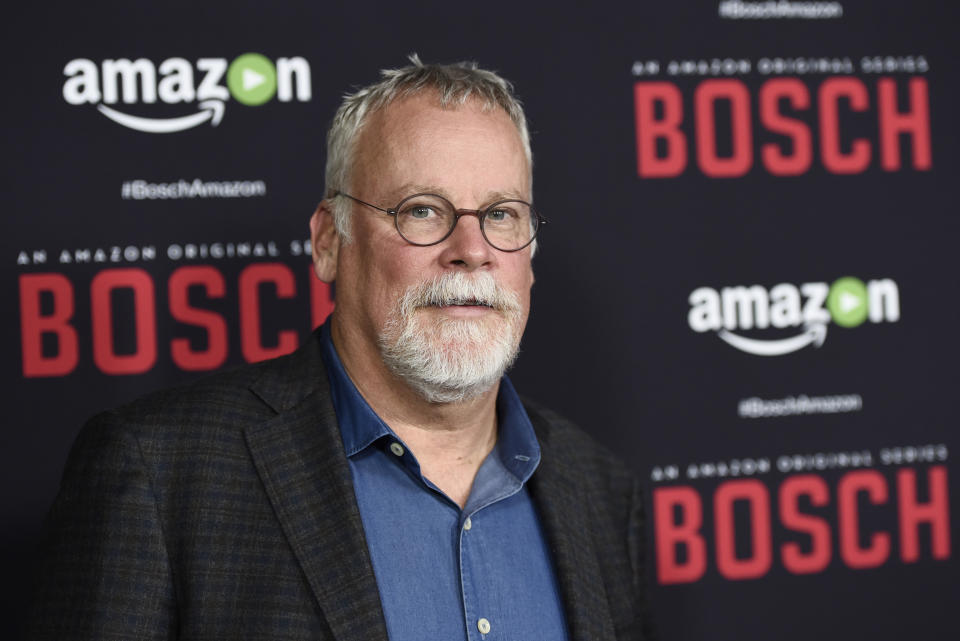 FILE - Michael Connelly, creator and co-writer of "Bosch," poses at the season two premiere of the Amazon original series in West Hollywood, Calif., on March 3, 2016. Connelly's "The Lincoln Lawyer" is also a Netflix series. (Photo by Chris Pizzello/Invision/AP, File)