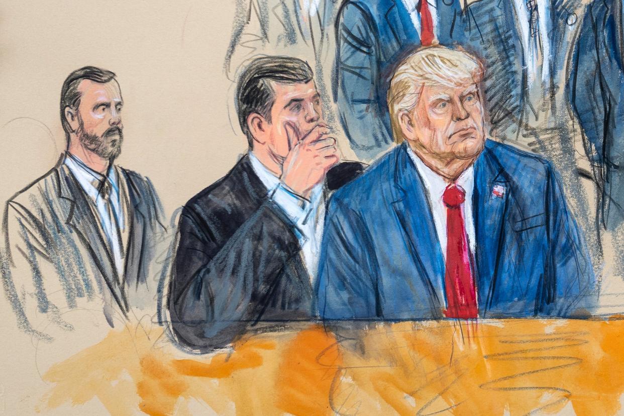 This artist sketch depicts former President Donald Trump, right, conferring with defense lawyer Todd Blanche, center, during his appearance at the Federal Courthouse in Washington (AP)