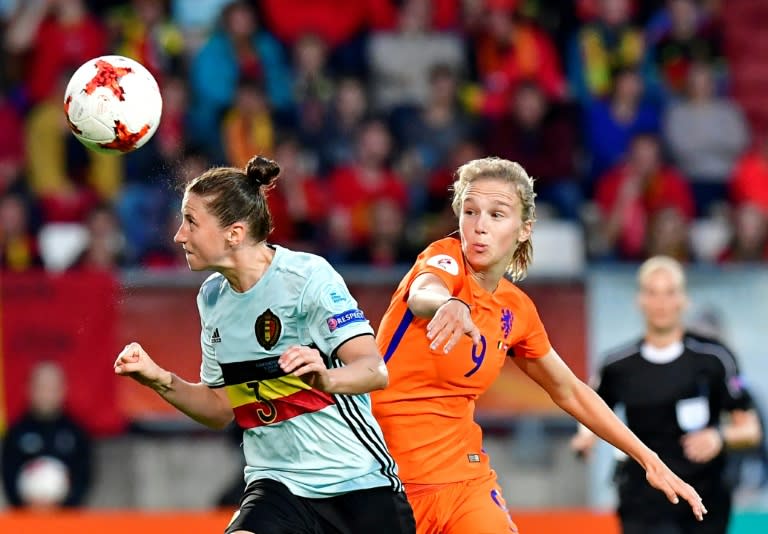 Belgium's Heleen Jaques (L) fights for the ball with the Netherlands' Vivianne Miedema during their UEFA Women's Euro 2017 match, at Stadium Koning Wilhelm II in Tilburg, on July 24