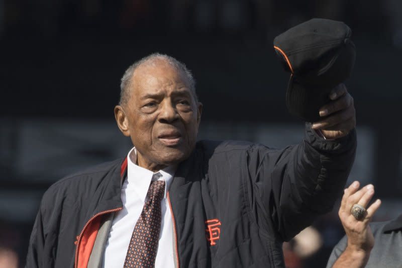 In this file photo, Hall of Fame San Francisco Giants player Willie Mays doffs his cap during a ceremony to retire Giant Barry Bonds' number 25 in San Francisco in 2018. Mays died Wednesday at age of 93. Photo by Terry Schmitt/UPI