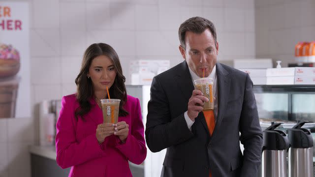 <p>Dunkin</p> Natalie Marshall, or Corporate Natalie, with Will Arnett.