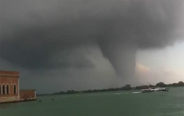 A tornado looms over Venice.