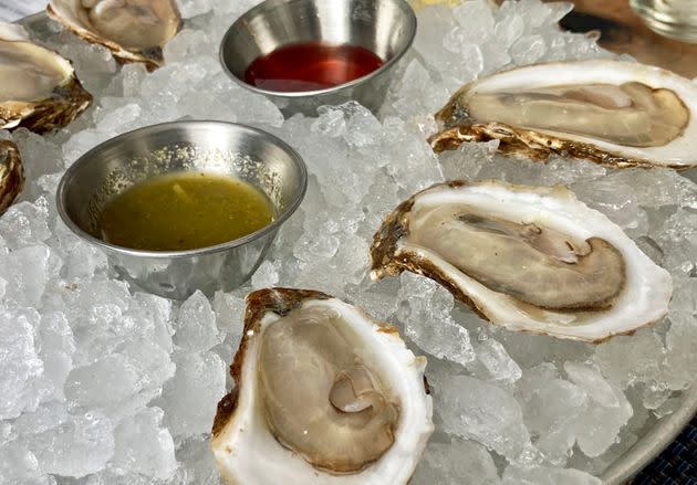 Close-up of oysters on the half-shell served on a bed of ice at a restaurant in Charleston, South Carolina. (Photo: photo by Pam Susemiehl via Getty Images)