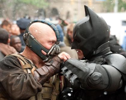 Tom Hardy as Bane and Christian Bale as Batman