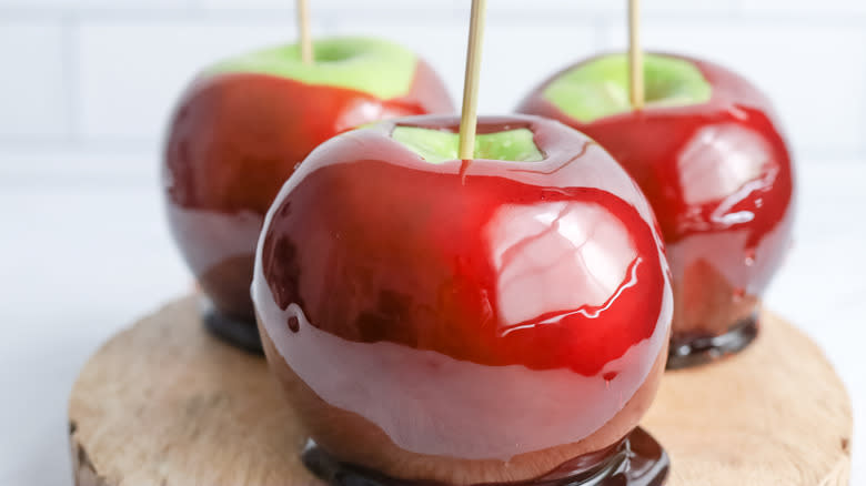 three candy apples