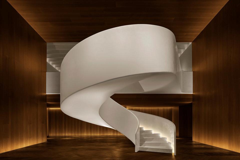 A spiral staircase inside The Madrid EDITION