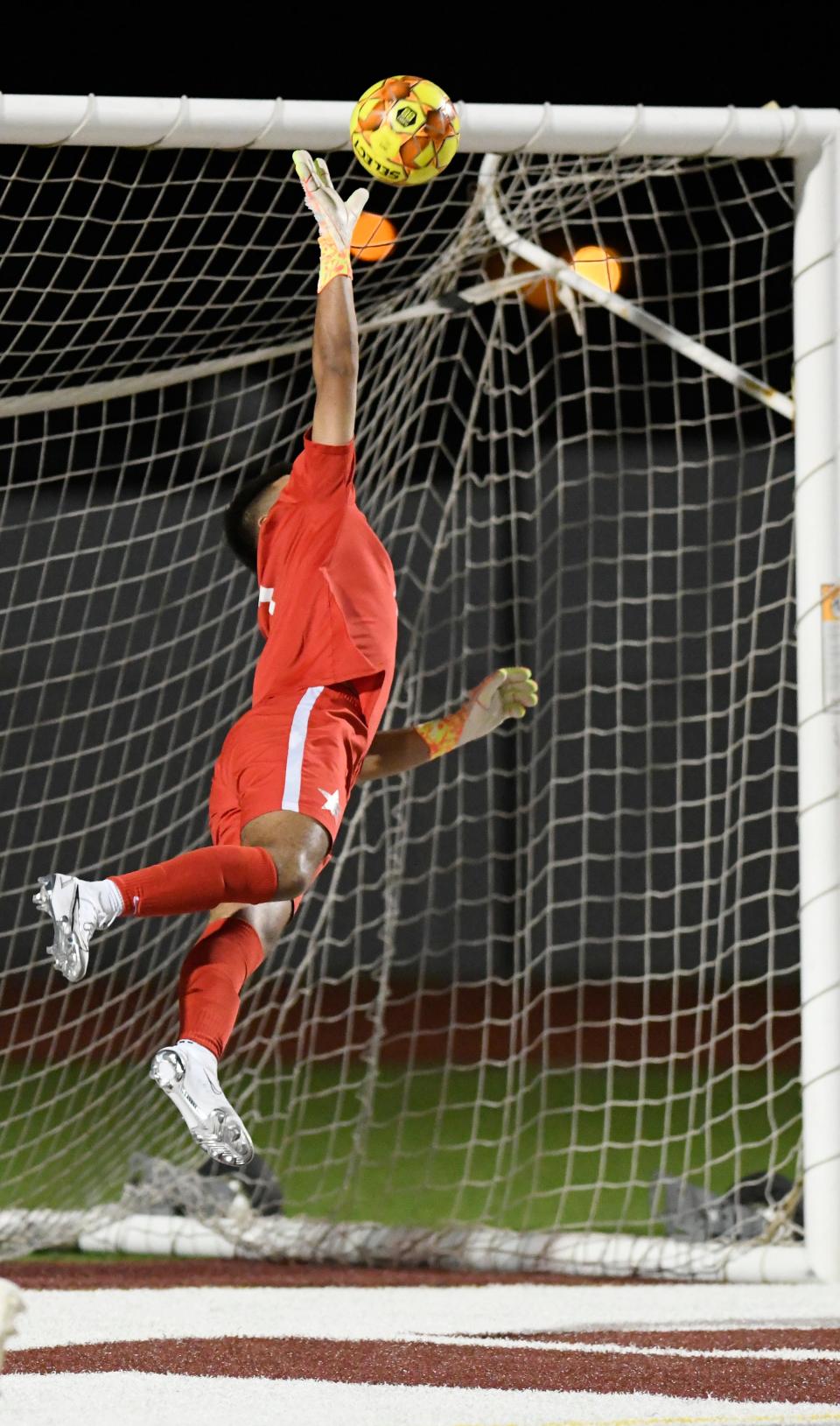 Ray's Jose Luis Macias saves a goal, Friday, Feb. 18, 2022, at Hornet Stadium in a District 29-5A soccer game. The game was tied, 0-0.