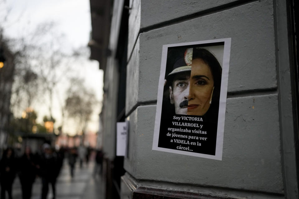 A photo montage of Victoria Villarruel, the running mate of Freedom Advances party presidential candidate Javier Milei, and Former dictator Jorge Rafael Videla is posted on a wall during a protest against Villarruel as she visited the Buenos Aires City Legislature to honor the 1970´s victims of armed leftist groups, in Buenos Aires, Argentina, Sept. 4, 2023. (AP Photo/Natacha Pisarenko)
