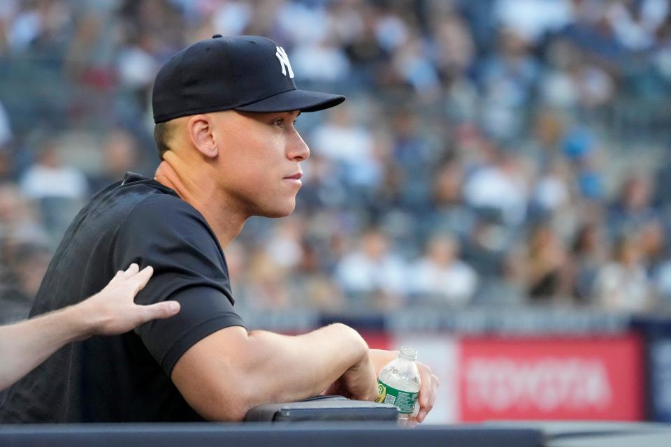 New York Yankees' Aaron Judge watches a baseball game from the dugout against the Kansas City Royals, Friday, July 21, 2023, in New York. (AP Photo/Mary Altaffer)