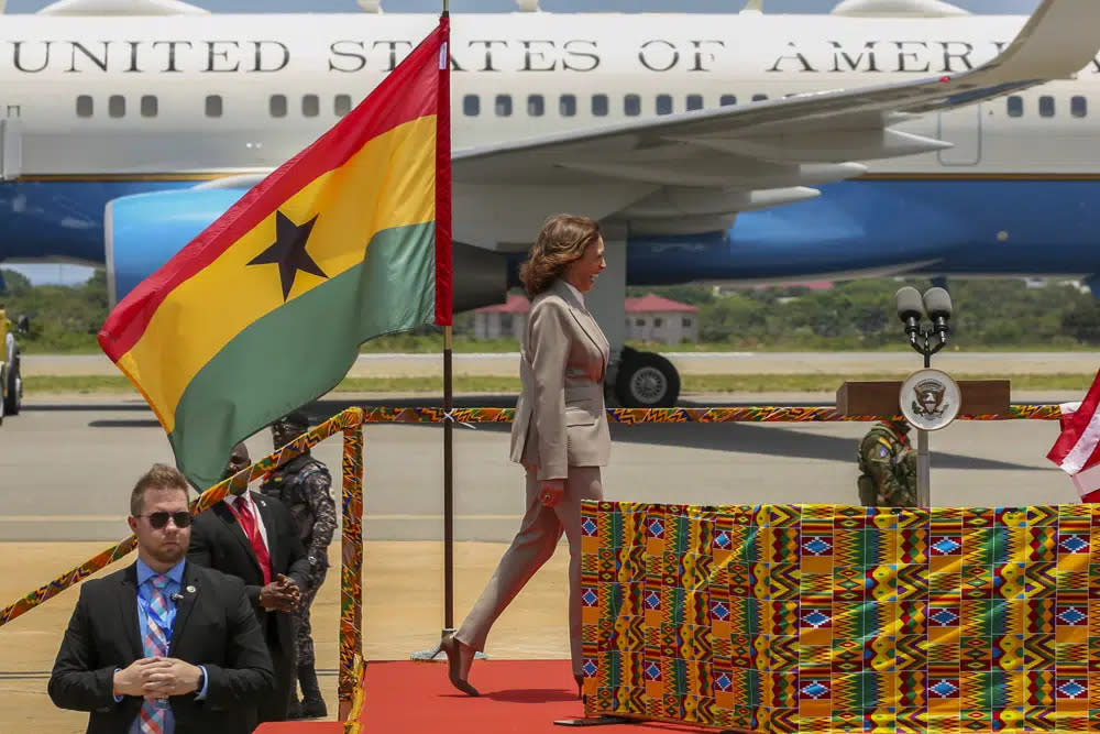 U.S. Vice President Kamala Harris smiles as she arrives in Accra, Ghana, Sunday March 26, 2023. (AP Photo/Misper Apawu)