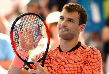 Tennis - Brisbane International - Pat Rafter Arena, Brisbane, Australia - 7/1/17 Bulgaria’s Grigor Dimitrov reacts after winning his match against Canada’s Milos Raonic. REUTERS/Steve Holland