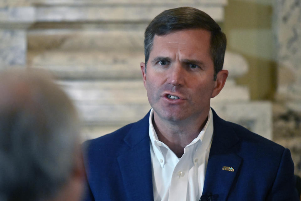 Kentucky Governor Andy Beshear answers questions during an interview with The Associated Press at the Kentucky State Capitol in Frankfort, Ky., Wednesday, Dec. 7, 2022. (AP Photo/Timothy D. Easley)