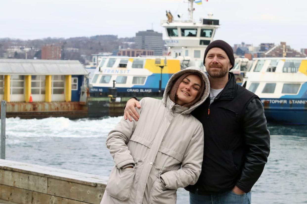 Anna Babkova and Scott Stephenson at the Halifax waterfront on Jan. 3, 2024. (Jeremy Hull/CBC - image credit)