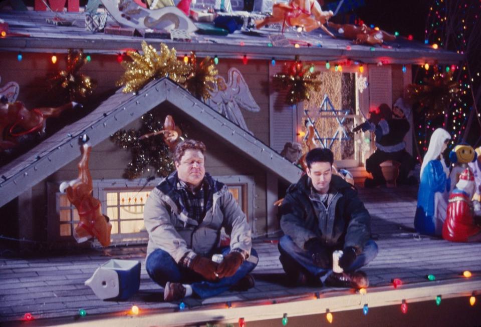 John Goodman and Glenn Quinn in the “White Trash Christmas” episode of “Roseanne,” showing this home’s exterior. Courtesy Everett Collection