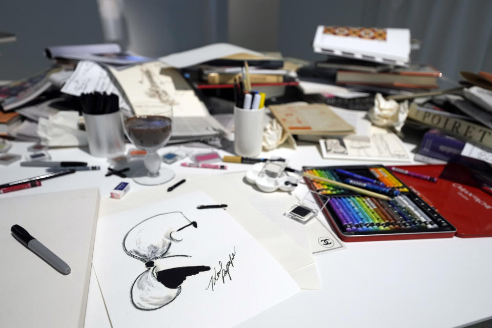 A recreation of Karl Lagerfeld's desk is displayed at the Metropolitan Museum of Art's Costume Institute exhibition, "Karl Lagerfeld: A Line of Beauty," on Saturday, April 29, 2023, in New York. (Photo by Charles Sykes/Invision/AP)