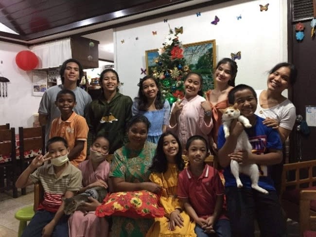 Youth and caretakers gather at the House of Love. Photo courtesy of SOS Children’s Villages Philippines.