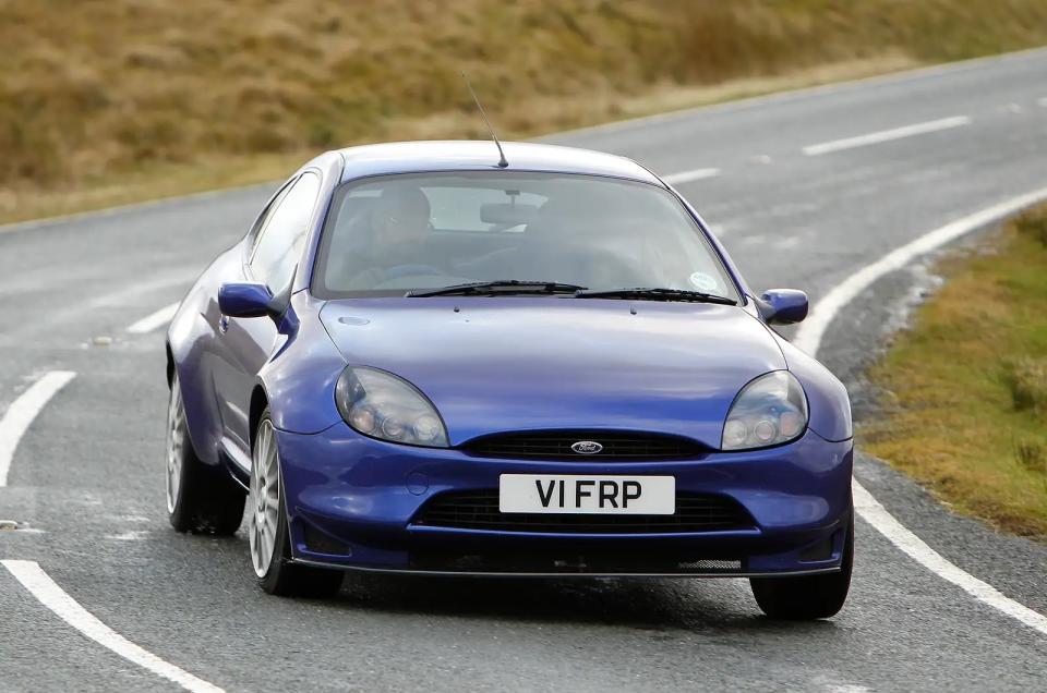 <p>In the 1990s, Mazda had the MX-3, Vauxhall had the Tigra, Fiat gave us the Barchetta, and in 1997, Ford offered the Puma, designed by <strong>Ian Callum</strong>. While it was available in 1.4, 1.6 and 1.7-litre variants, the 123bhp Yamaha-developed 1.7-litre was the option people favoured and would haul the <strong>1039kg </strong>kerb weight to 62mph from rest in just over 9sec. </p><p>Underneath was a chassis from a fourth-generation Fiesta with uprated suspension and a lower and wider track, which gave darty handling. A rarer Racing Puma arrived in 1999, to meet rally homologation regulations, with wider arches, uprated camshafts and exhaust, as well as stiffer suspension, and around <strong>30bhp </strong>extra.</p>