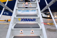 Passengers board a Ryanair flight at Stansted Airport, Britain, October 12, 2017. REUTERS/Hannah McKay
