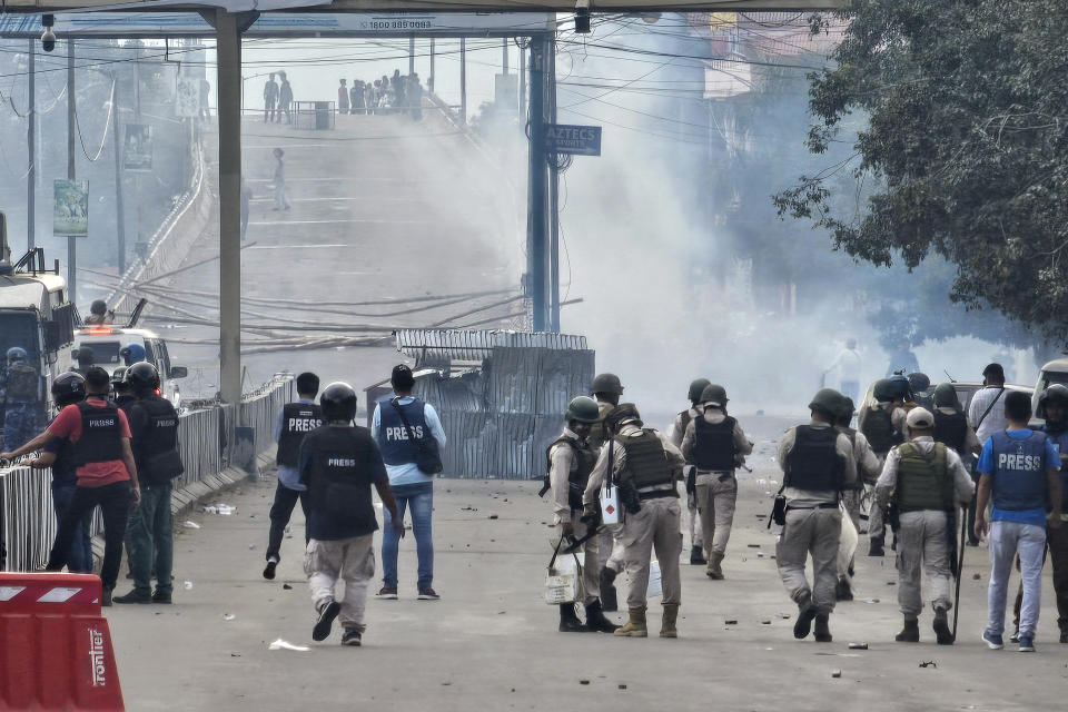 Police fire tear gas shells to disperse students protesting against a fresh wave of ethnic violence in Imphal, in India's northeastern state of Manipur, Tuesday, Sept. 10, 2024. (AP Photo/Paojel Chaoba)