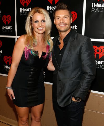 <p>Isaac Brekken/Getty Images</p> Britney Spears with Ryan Seacrest in Las Vegas in September 2012