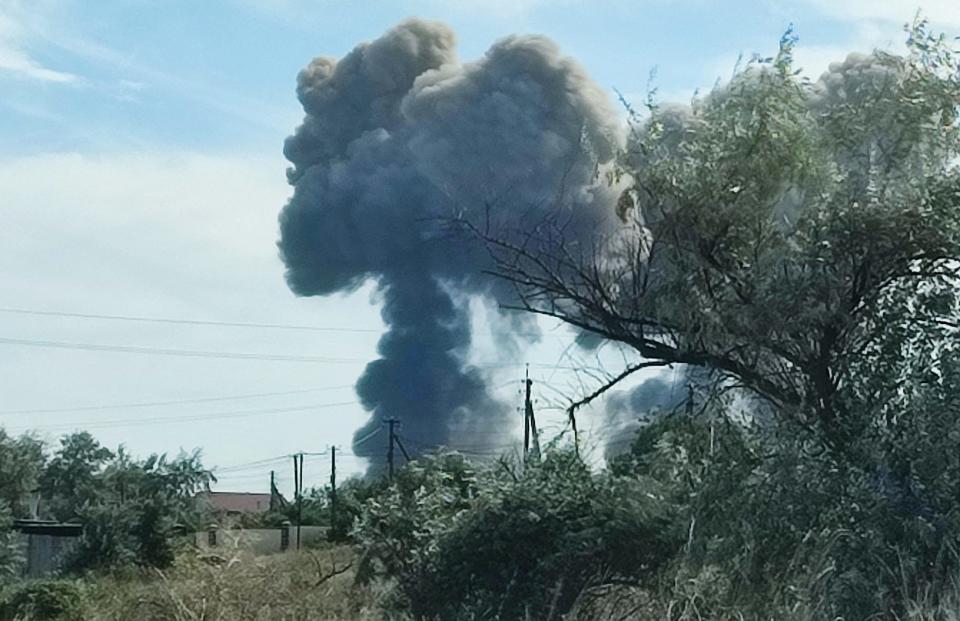 Smoke rises after explosions were heard from the direction of a Russian military airbase near Novofedorivka, Crimea August 9, 2022