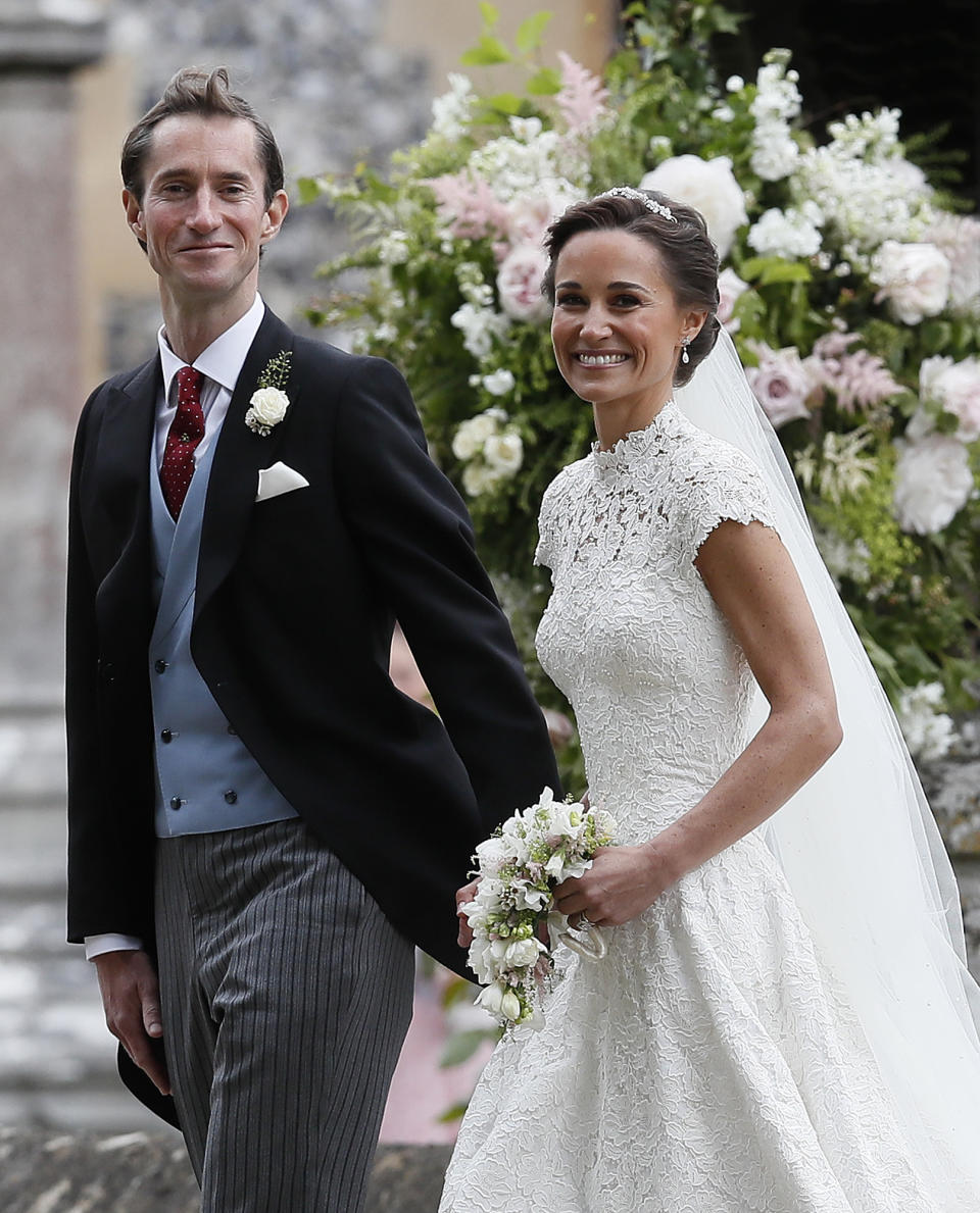 Pippa and James leave the church as newlyweds