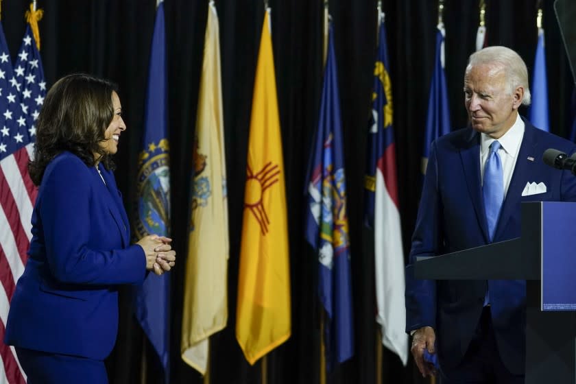 WILMINGTON, DE - AUGUST 12: Democratic presidential candidate former Vice President Joe Biden invites his running mate Sen. Kamala Harris (D-CA) to the stage to deliver remarks at the Alexis Dupont High School on August 12, 2020 in Wilmington, Delaware. Harris is the first Black woman and first person of Indian descent to be a presumptive nominee on a presidential ticket by a major party in U.S. history. (Photo by Drew Angerer/Getty Images)