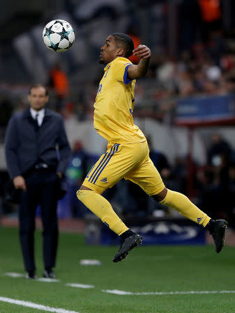 Soccer Football - Champions League - Olympiacos vs Juventus - Karaiskakis Stadium, Piraeus, Greece - December 5, 2017 Juventus’ Douglas Costa in action REUTERS/Alkis Konstantinidis