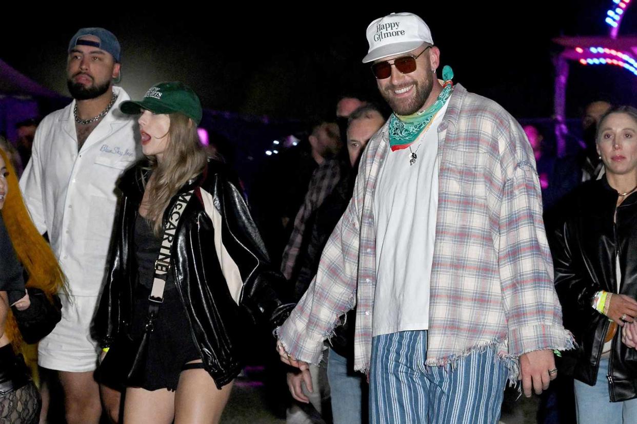 <p>Gilbert Flores/WWD via Getty Images</p> Taylor Swift and Travis Kelce at Neon Carnival held during the Coachella Music and Arts Festival on April 13, 2024