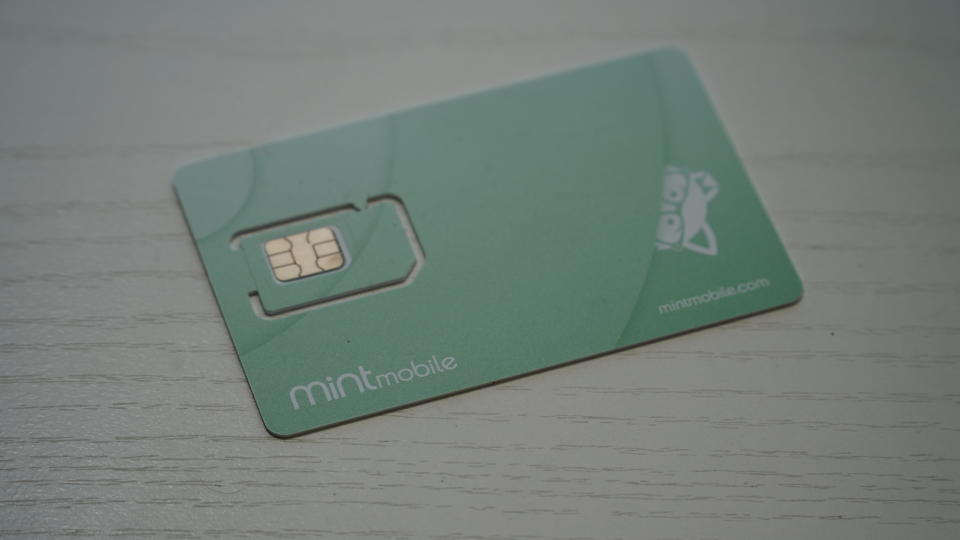 An unused Mint Mobile SIM card with multiple sizes supported