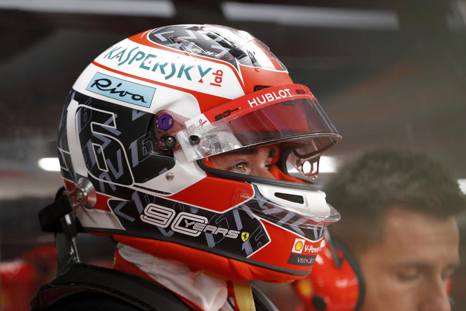 Ferrari driver Charles Leclerc of Monaco prepares for the first practice session at the Marina Bay City Circuit ahead of the Singapore Formula One Grand Prix in Singapore, Friday, Sept. 20, 2019. (AP Photo/Vincent Thian)