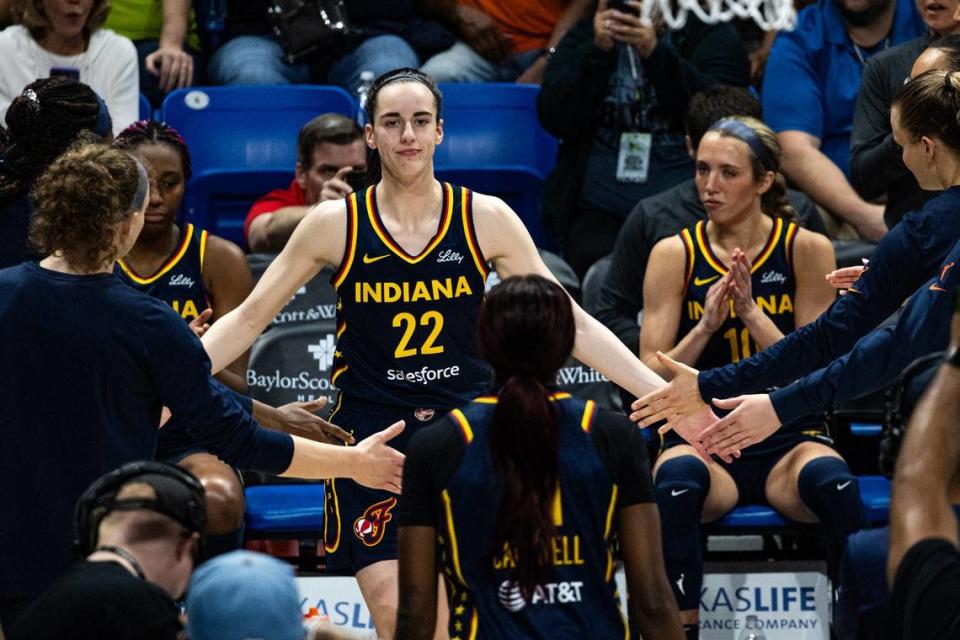 Indiana Fever guard Caitlin Clark (22) is announced as a starter prior to a WNBA preseason game against the Dallas Wings at College Park Center in Arlington on Friday, May 3, 2024. Clark is making her highly anticipated professional debut after going as the number one pick in the 2024 draft.