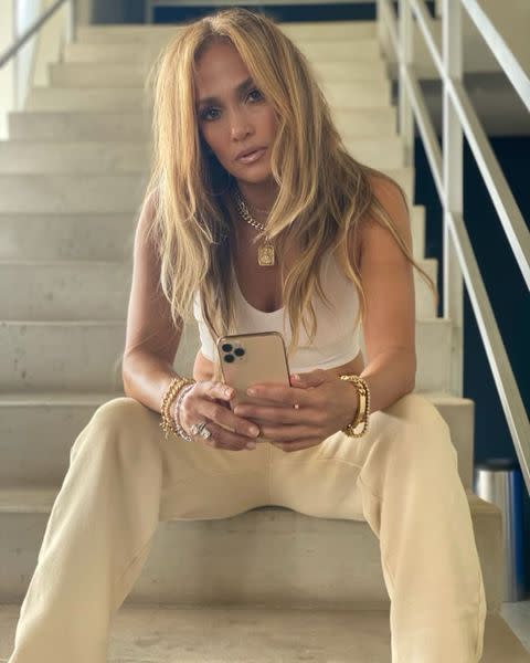 <p>The 51 year-old glammed-up her sports bra and tracksuit bottoms with plenty of <a href="https://www.elle.com/uk/fashion/what-to-wear/g34359363/best-designer-jewellery/" rel="nofollow noopener" target="_blank" data-ylk="slk:stacked, chunky jewellery;elm:context_link;itc:0;sec:content-canvas" class="link ">stacked, chunky jewellery</a> while on set for her next film Shotgun Wedding'.</p><p><a class="link " href="https://www.elle.com/uk/fashion/what-to-wear/articles/g31236/best-loungewear-tops-trousers-robes-to-buy-now/" rel="nofollow noopener" target="_blank" data-ylk="slk:SHOP LOUNGEWEAR NOW;elm:context_link;itc:0;sec:content-canvas">SHOP LOUNGEWEAR NOW</a></p><p><a href="https://www.instagram.com/p/CNfxeIXpVtf/" rel="nofollow noopener" target="_blank" data-ylk="slk:See the original post on Instagram;elm:context_link;itc:0;sec:content-canvas" class="link ">See the original post on Instagram</a></p>