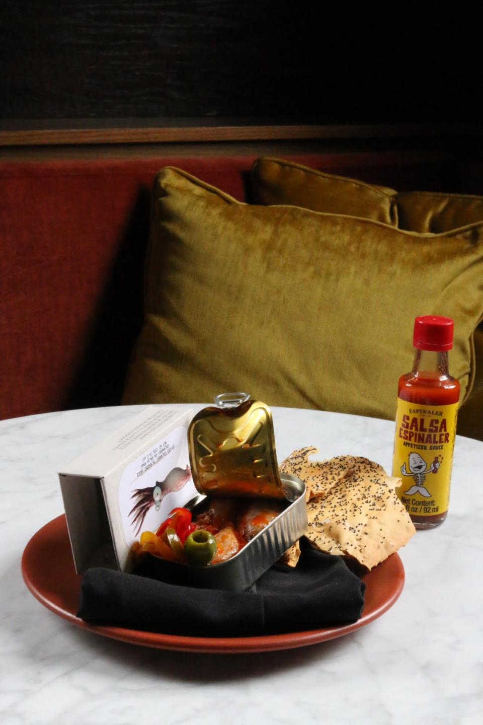 A tin fish dish served at Switchboard, a restaurant inside The Myriad Hotel, 900 Baxter Ave., in Louisville.