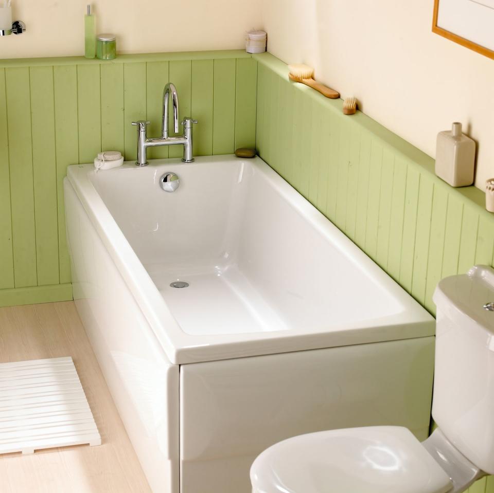 interior of a luxurious bathroom with bathtub in green tone