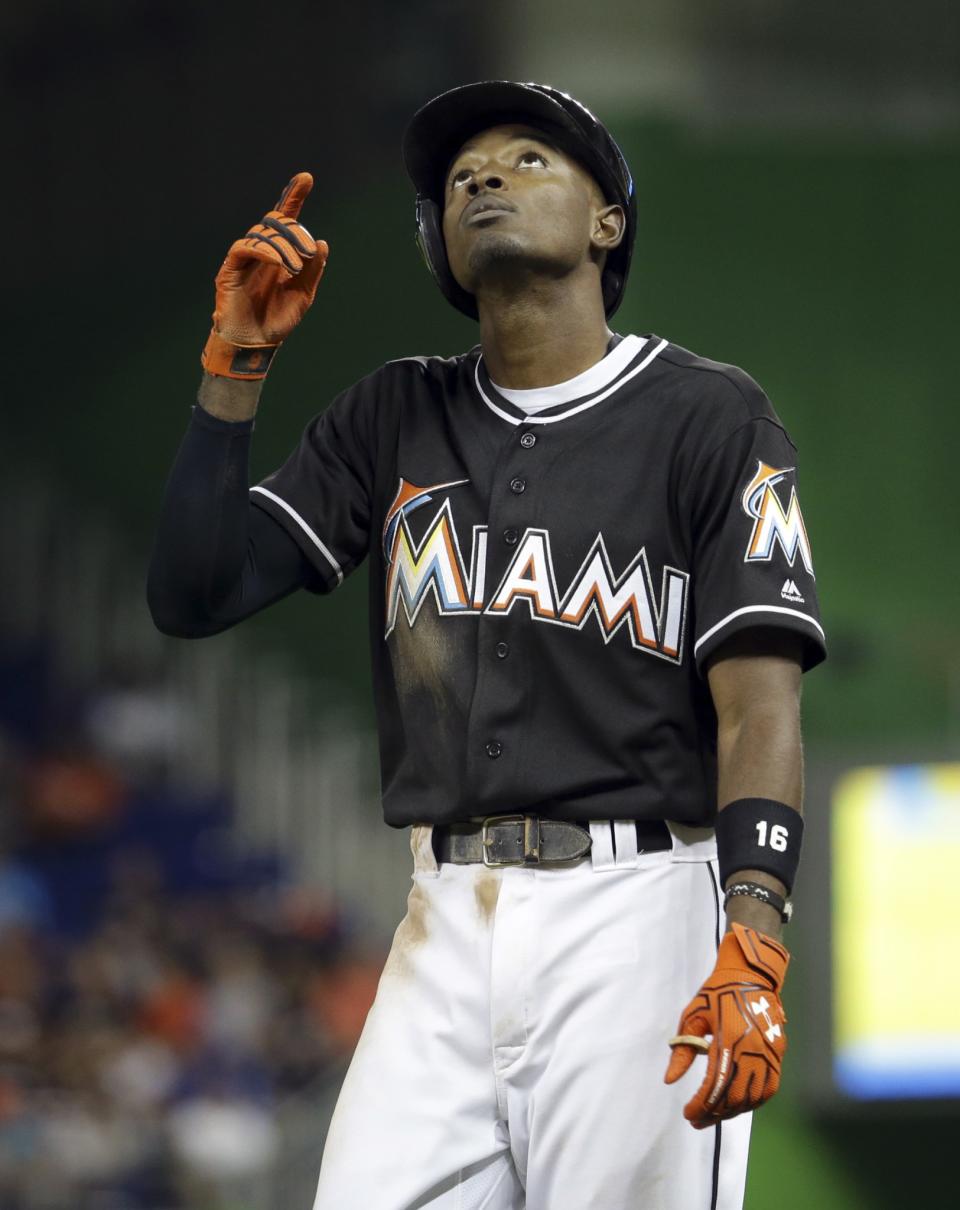 <p>Miami Marlins’ Dee Gordon points to the sky after hitting a single during the fourth inning of a baseball game against the New York Mets, Monday, Sept. 26, 2016, in Miami. (AP Photo/Lynne Sladky) </p>