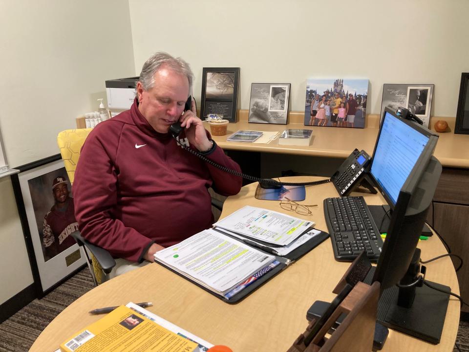 Jeff Boyer, Licking Height Local Schools' truancy, residency and athletic consultant, make a phone call about student attendance. Boyer, a retired teacher, is in his eighth year in the position.