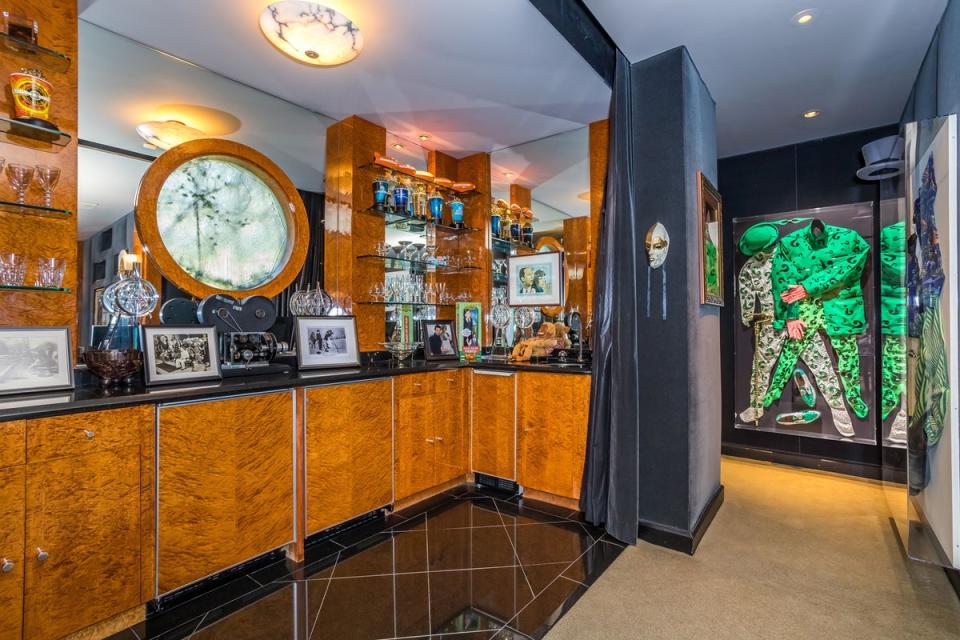 Carrey’s Riddler suit from Batman Forever and a selection of awards in his “snack area” (Daniel Dahler for Sotheby’s International Realty)