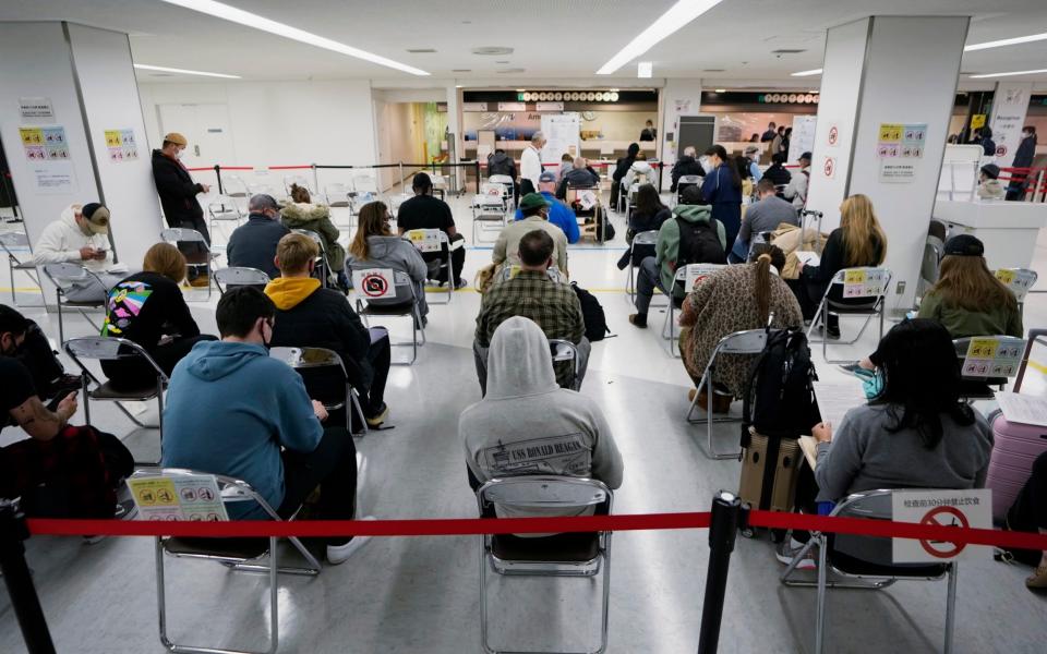 Japan border control -  Hiro Komae/AP