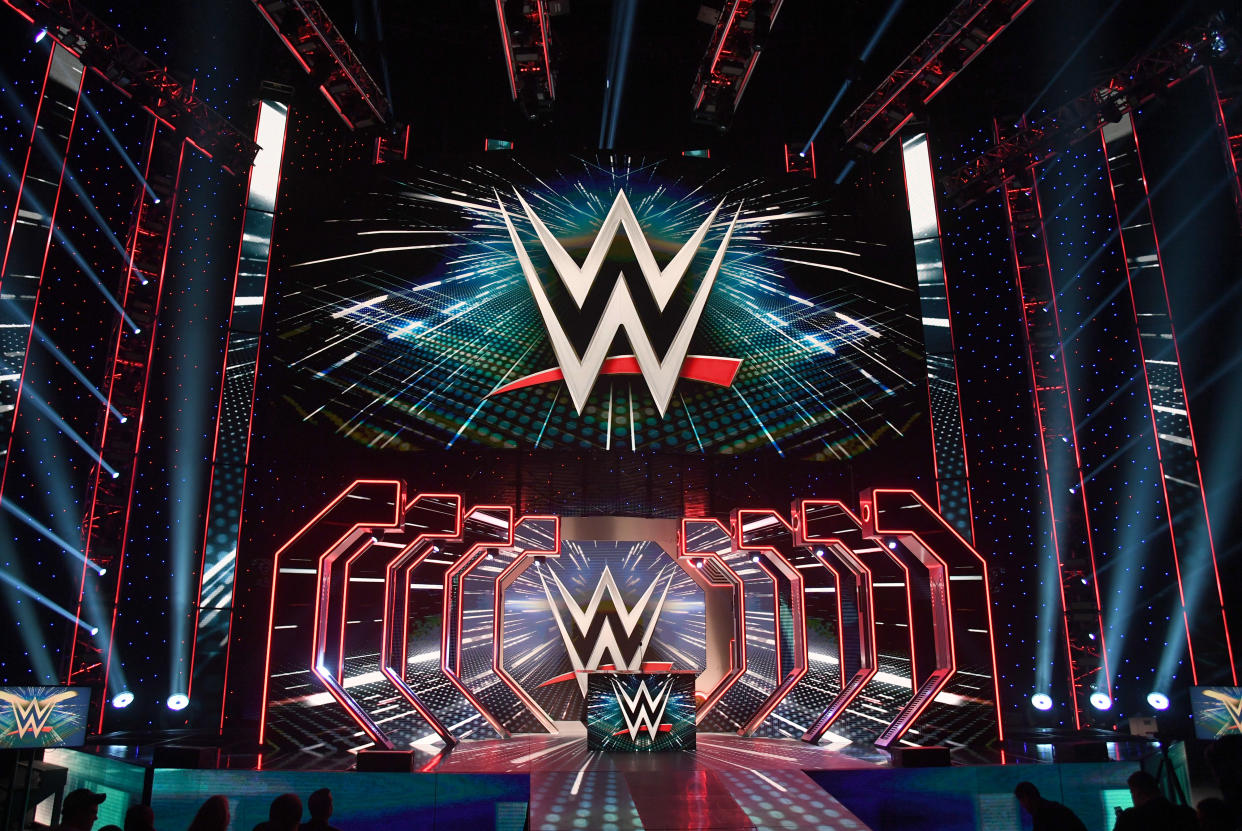 LAS VEGAS, NEVADA - OCTOBER 11:  WWE logos are shown on screens before a WWE news conference at T-Mobile Arena on October 11, 2019 in Las Vegas, Nevada. It was announced that WWE wrestler Braun Strowman will face heavyweight boxer Tyson Fury and WWE champion Brock Lesnar will take on former UFC heavyweight champion Cain Velasquez at the WWE's Crown Jewel event at Fahd International Stadium in Riyadh, Saudi Arabia on October 31.  (Photo by Ethan Miller/Getty Images)