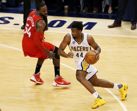 Apr 29, 2016; Indianapolis, IN, USA; Indiana Pacers forward Solomon Hill (44) dribbles the ball past Toronto Raptors forward Patrick Patterson (54) during the first quarter in game six of the first round of the 2016 NBA Playoffs at Bankers Life Fieldhouse. Mandatory Credit: Brian Spurlock-USA TODAY Sports