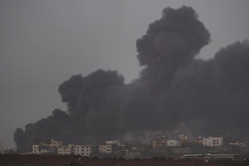 Smoke rises to the sky after an explosion in Gaza Strip as seen from