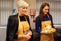 Kate Middleton happily donned an apron on Wednesday, helping to prepare lunch during a visit to the homelessness charity Centrepoint.