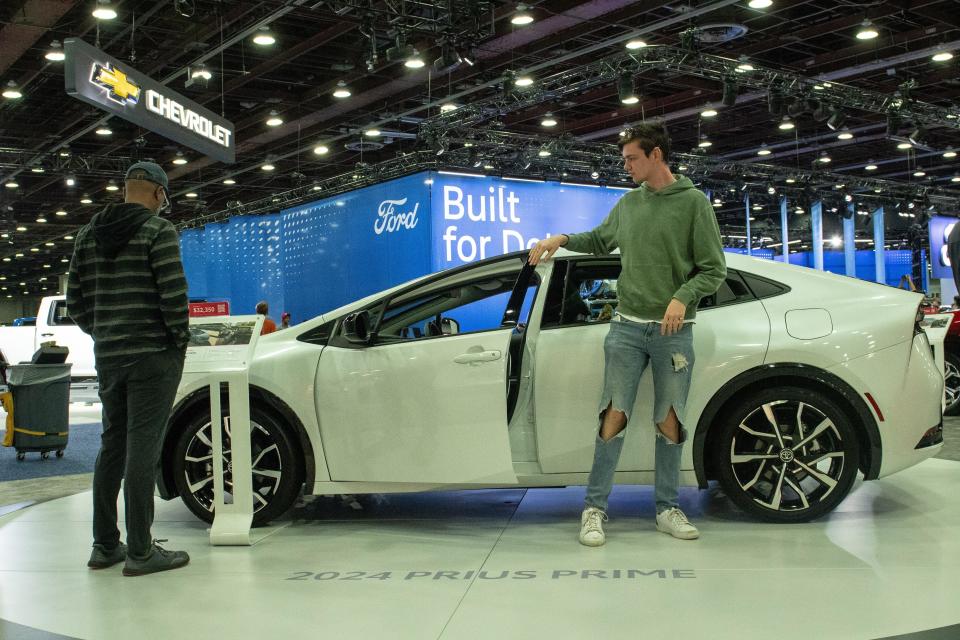 The 2024 Toyota Prius Prime plug-in hybrid vehicle on display at the North American International Auto Show. / Credit: Adam J. Dewey/Anadolu Agency via Getty Images