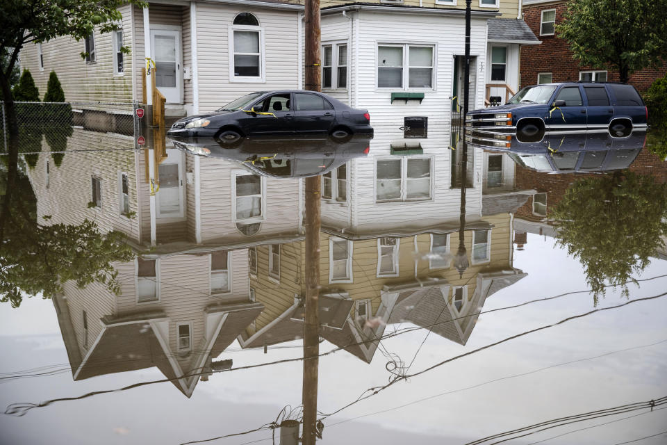 Floodwaters partially submerge vehicles on Broadway in Westville, N.J. Thursday, June 20, 2019. Severe storms containing heavy rains and strong winds spurred flooding across southern New Jersey, disrupting travel and damaging some property. (Photo: Matt Rourke/AP)