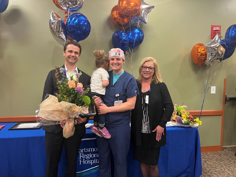 Chelsie Portlock, RN, of Hampton, who works in surgical services, is the 2022 Nurse of the Year at Portsmouth Regional Hospital. Pictured with Dean Carucci, market president, HCA New England Healthcare, and CEO of Portsmouth Regional Hospital, and Nancy Seskes, RN, associate chief nursing officer.