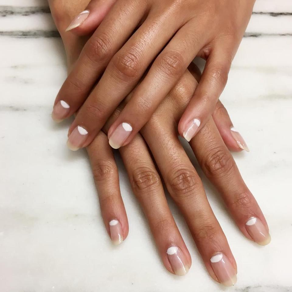 <p>Spring cleaning calls for minimal nails, but that doesn't mean you have to go completely bare. Try this clean look by painting nude half moons to match your natural color, then finishing with a clear topcoat. </p><p><em>Design by <a href="https://www.instagram.com/p/BNU8WcJBwkm/" rel="nofollow noopener" target="_blank" data-ylk="slk:@torihnails;elm:context_link;itc:0;sec:content-canvas" class="link ">@torihnails</a></em></p>