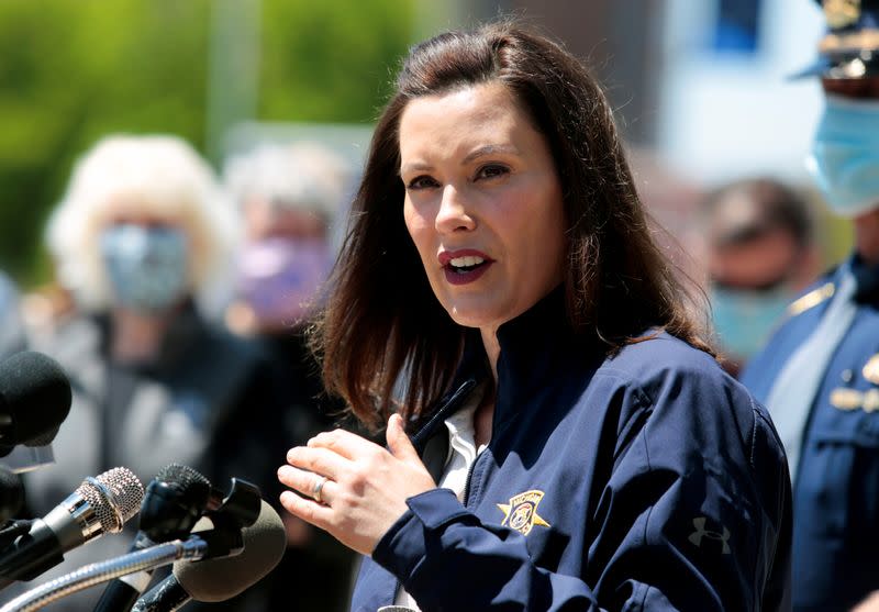 Michigan Governor Gretchen Whitmer addresses the media about the flooding along the Tittabawassee River, after several dams breached, in downtown Midland