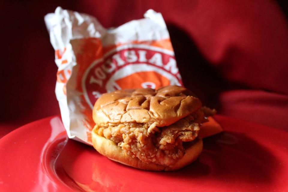 Popeyes’ crispy chicken sandwich is topped with pickle slices and classic mayo between two toasted brioche buns. Dreamstime/TNS